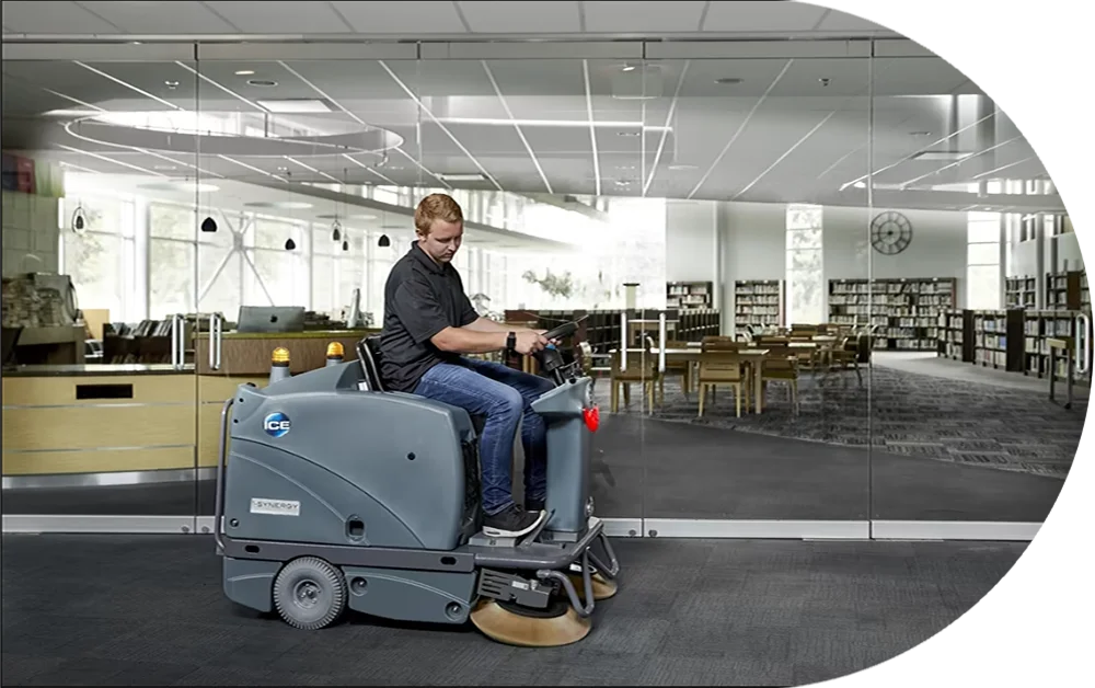 Guy-riding-sweeper